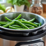 découvrez comment cuire les haricots verts à la cocotte minute rapidement avec nos astuces et temps de cuisson précis pour des légumes croquants et savoureux.